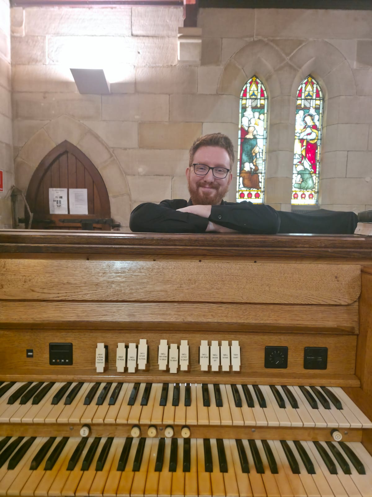 Organist at church keyboard